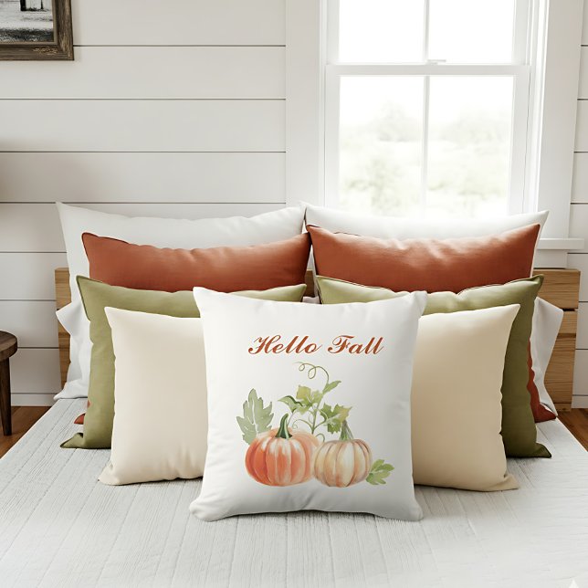 Coussin Aquarelle simple Accentuation de chute moderne (“Hello Fall” pillow with watercolor pumpkins decorates a bright autumn-inspired sofa.)