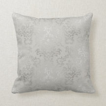 Coussin argenté de damassé