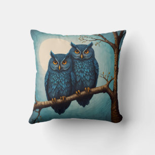 Coussin Belle paire bleue de chouettes assise sur une bran
