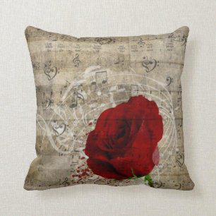 Coussin Belle rose rouge notes piano tourbillonné