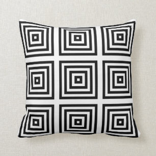 Coussin blanc noir de dessin géométrique
