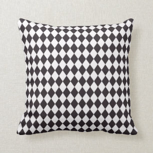 Coussin blanc noir de motif de diamants de damier
