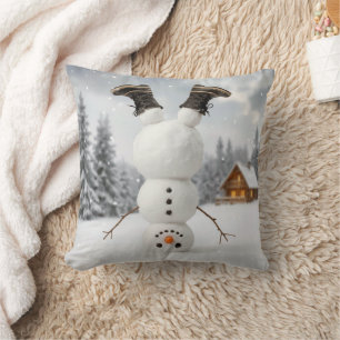 Coussin Bonhomme de neige faisant un équilibre sur la tête