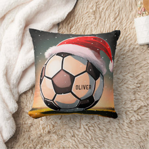 Coussin Boule de football avec chapeau rouge Père Noël