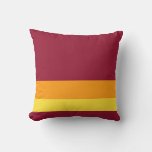 Coussin Bourgogne avec lignes de séparation orange et jaun