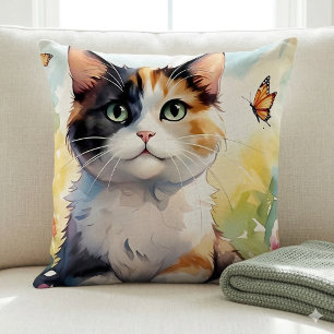 Coussin Calico Cat dans le jardin de printemps avec papill