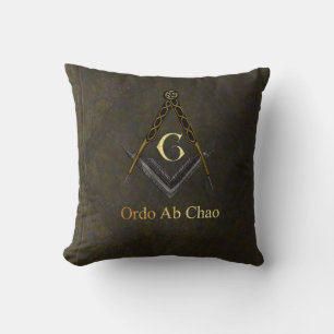 Coussin Carré et boussole du livre de cuir