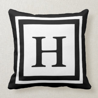Coussin Carreau décoré d'un monogramme - noir et blanc