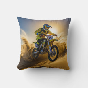 Coussin Cavalier de motocross roulant dans les dunes