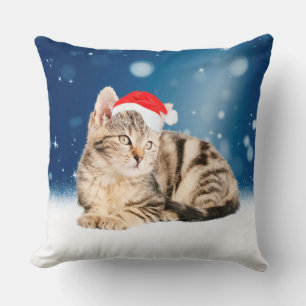 Coussin Chat mignon portant chapeau de Noël rouge neige