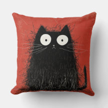 Chat noir surpris sur cramoisi vif