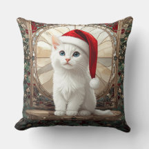 Chaton blanc avec chapeau de Père Noël