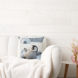 Coussin Chick en pingouin mignon faisant un ange de neige