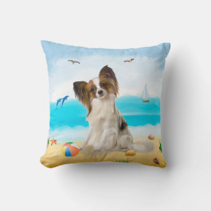 Coussin Chien de Papillon sur la plage