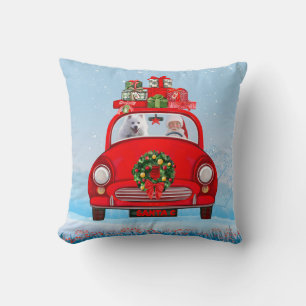 Coussin Chien esquimau américain dans une voiture avec le 