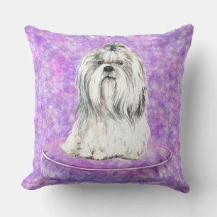 COUSSIN CHIEN MALTESSE BLANC ASSIS DANS UN LIT DE CHIEN
