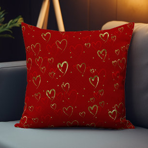 Coussin Cœurs rouges et dorés sur motif rouge de la Saint-