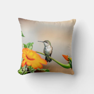 Coussin Colibri sur un plante à fleurs