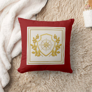 Coussin Compas de crête et laurier dorés royaux sur fond r