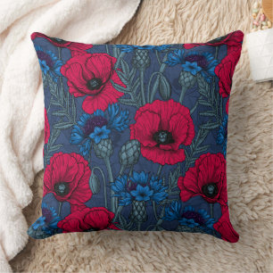 Coussin Coquelicots rouges et fleurs bleues sur bleu