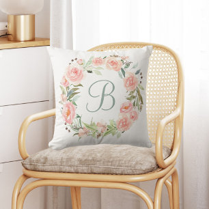 Coussin Couronne de fleurs rose pastel monogrammée