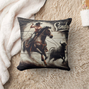 Coussin Cowgirl Roping a Bull à un Rodeo Event
