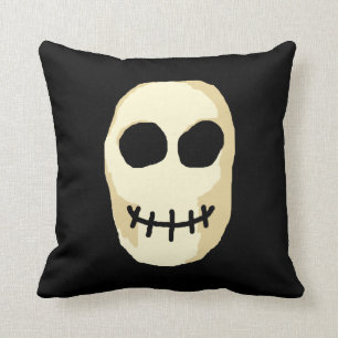 Coussin Crème et crâne noir.