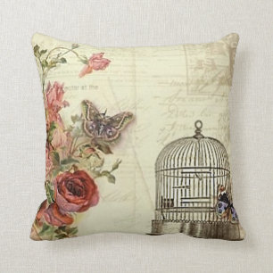 Coussin Cru avec la cage à oiseaux de roses