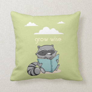 Coussin Cute raccoon reading à book. Green children pillow