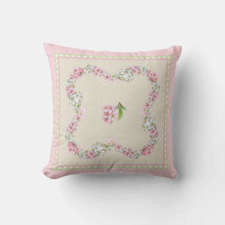 Coussin de fleurs de printemps rose et blanc