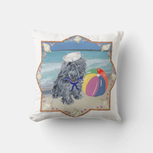Coussin de jet de Griffon bruxellois à la plage