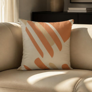 Coussin de jet géométrique orange et crème scandin