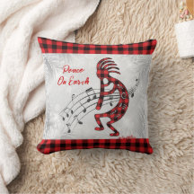 Coussin de Noël Kokopelli, rouge et noir