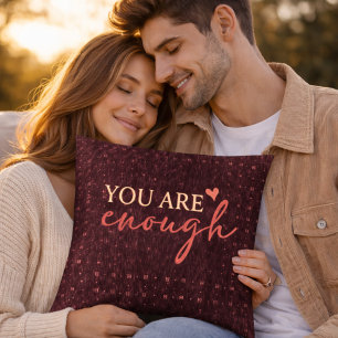 Coussin décoratif bordeaux avec citation inspirant