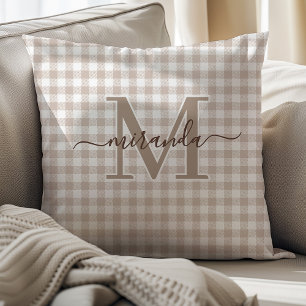 Coussin décoratif marron à carreaux et monogramme
