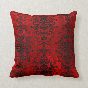 Coussin Des dessins de défilement noirs aux tons rouges