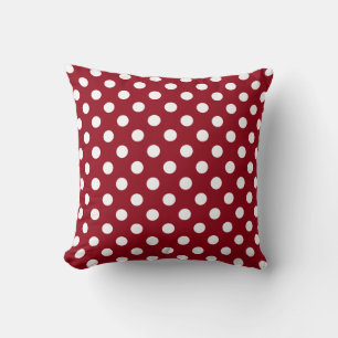 Coussin Des pois blancs sur fond rouge cramoisi