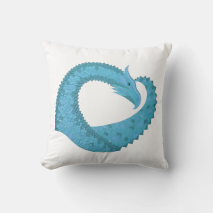Coussin dragon au cœur de sarcelle sur fond blanc