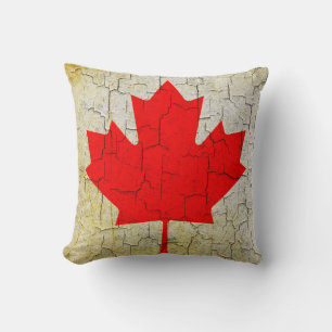 Coussin Drapeau vintage du Canada sur un mur fissuré