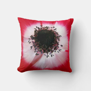 Coussin du centre de fleurs rouges