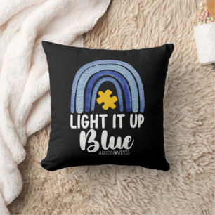 Coussin Éclairez-le en bleu arc-en-ciel de sensibilisation