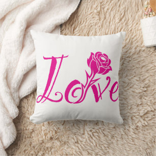 Coussin Élégance florale : l'amour illustré avec une rose