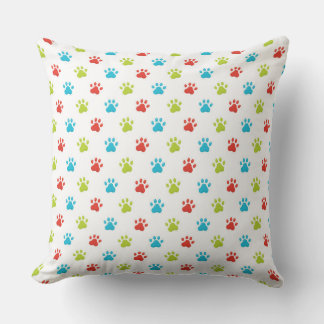 COUSSIN EMPREINTES DE PATTES BLEU VERT ROUGE ET BONNES DE