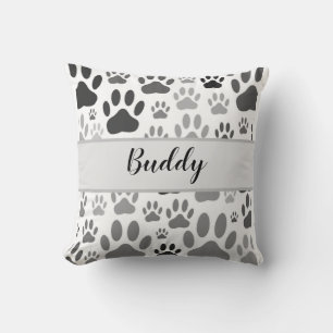 Coussin Empreintes de pattes de chiens partout sur le nom
