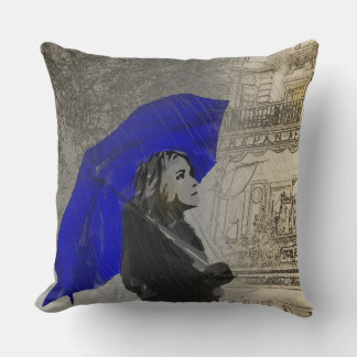 Coussin Femme avec parapluie sous la pluie