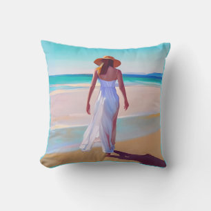 Coussin Femme en blanc sur la plage