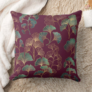 Coussin Feuilles de Ginkgo sarcelle et or sur fond bordeau