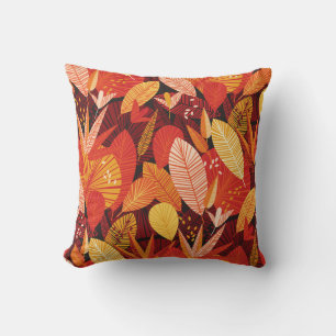 Coussin Feuilles tropicaux : Foliage géométrique coloré.