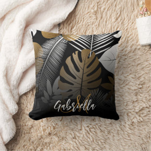 Coussin Feuilles tropicaux noirs et dorés