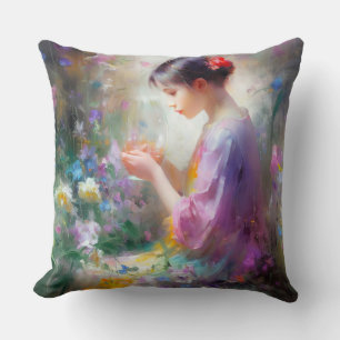 Coussin Fille admirant une fleur dans ses mains